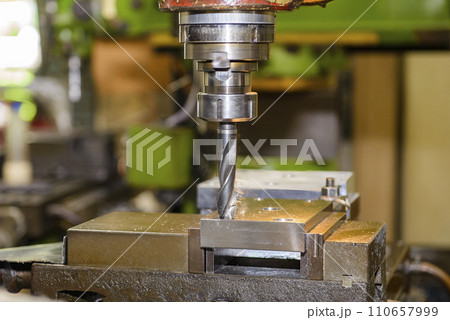 The drilling process on NC milling machine with brass material. The drilling process on NC milling machine with brass material. 110657999
