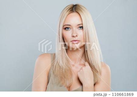 Glorious blonde woman with long straight hair and clean fresh pure perfect skin isolated Glorious blonde woman with long straight hair and clean fresh pure perfect skin isolated 110661869