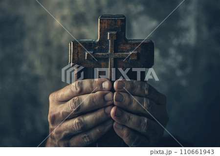 close up person holding bible while praying close up person holding bible while praying 110661943