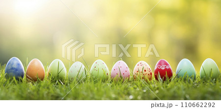 AI-generated content. Colorful Easter Eggs Lined Up in Spring Grass 110662292