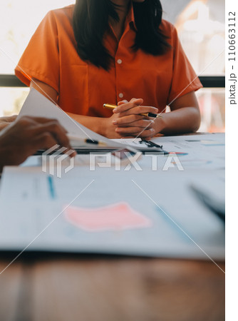 Co working conference, Business team meeting present, investor colleagues discussing new plan financial graph data on office table with laptop and digital tablet, Finance, accounting, investment. 110663112