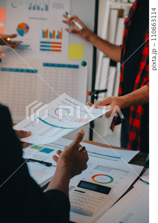 Co working conference, Business team meeting present, investor colleagues discussing new plan financial graph data on office table with laptop and digital tablet, Finance, accounting, investment. 110663114