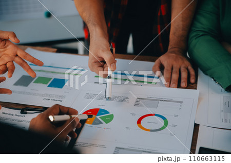 Co working conference, Business team meeting present, investor colleagues discussing new plan financial graph data on office table with laptop and digital tablet, Finance, accounting, investment. 110663115