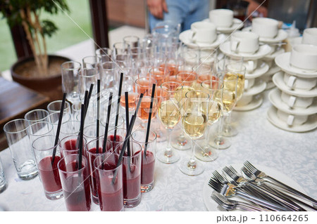 light snacks for the holiday, catering. Various light snacks. Catering plate. Assortment of sandwiches on the buffet table. meat, fish, vegetable canapes. 110664265