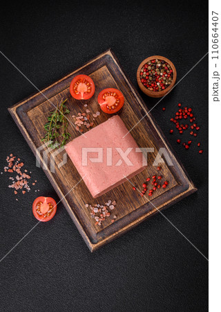 Delicious canned pink ham with salt, spices and herbs 110664407