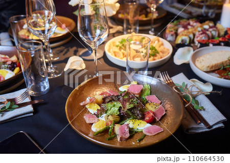 Tuna salad with lettuce, eggs and tomatoes. Tuna salad with lettuce, eggs and tomatoes. 110664530