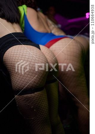 Thin young woman in underwear on beige background. Back view.. Body and skin care, fitness. 110664938