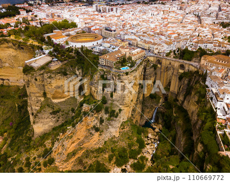 Rocky landscape of Ronda city with Puente Nuevo Bridge and buildings Rocky landscape of Ronda city with Puente Nuevo Bridge and buildings 110669772