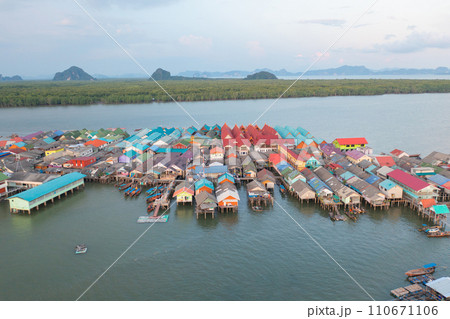 Aerial view of Koh Panyee, The Floating village urban city town houses, lake sea or river. Nature landscape fisheries and fishing tools at Pak Pha, Phang Nga, Thailand. Aquaculture farming 110671106