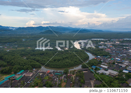 Aerial view of Ranong City, The Floating village urban city town houses, lake sea or river. Nature landscape fisheries and fishing tools, Thailand. Aquaculture farming 110671150