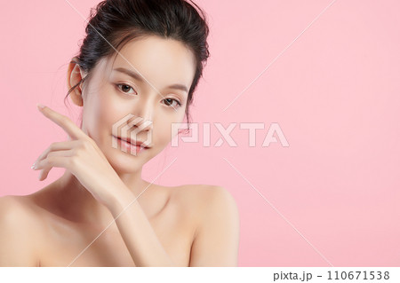 Beautiful young asian woman with clean fresh skin on pink background, Face care, Facial treatment, Cosmetology, beauty and spa, Asian women portrait. 110671538