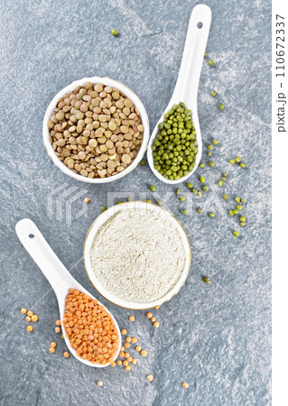 Flour lentil in bowl on stone table top Flour lentil in bowl on stone table top 110672337