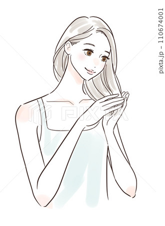 笑顔で髪のお手入れをする女性 110674001