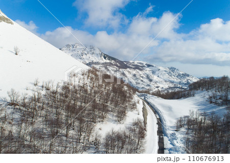 winter mountain road form above 110676913