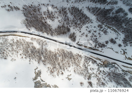 winter mountain road form above 110676924