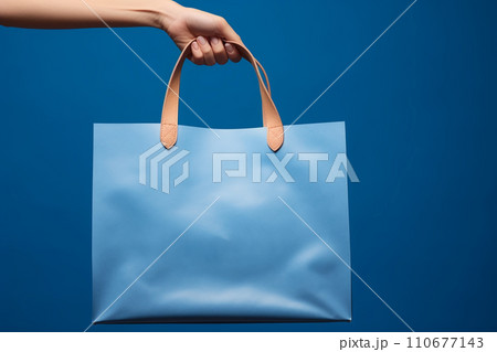Generative AI A shopping bag on a blue backgroundのイラスト素材 [110677143 ...