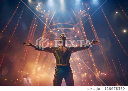 Generative AI Man performing a show in the circus arenas generated by AI 110678580