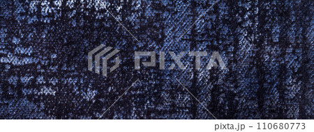 Texture of velvet navy blue background from soft upholstery textile material, macro. Abstract velour dark denim fabric 110680773