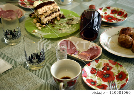 View of a table with dishes after dinner. 110681060