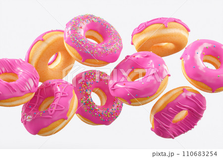 Chocolate glazed donut with sprinkles in motion falling on a white background. Chocolate glazed donut with sprinkles in motion falling on a white background. 110683254