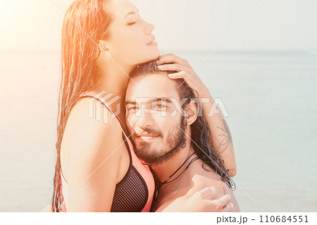 Woman man sea sup. Close up portrait of happy young caucasian wo Woman man sea sup. Close up portrait of happy young caucasian wo 110684551