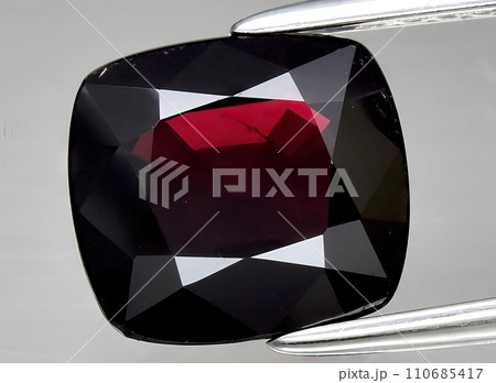 natural red spinel gem on the background natural red spinel gem on the background 110685417