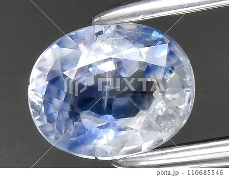 natural blue sapphire gem on the background natural blue sapphire gem on the background 110685546