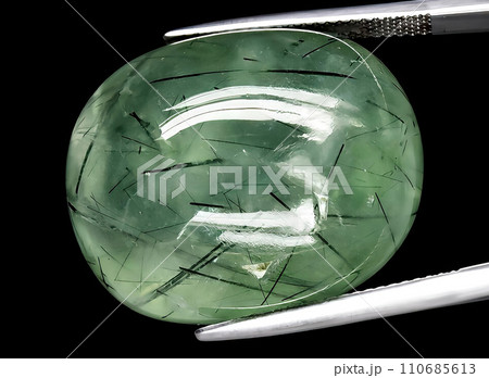 natural green prehnite gem on the background natural green prehnite gem on the background 110685613