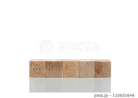 Wooden cubes with letters music on a white background 110685646