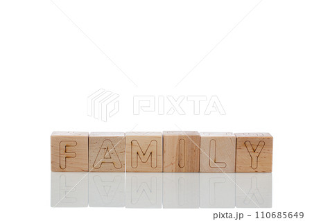 Wooden cubes with letters family on a white background Wooden cubes with letters family on a white background 110685649