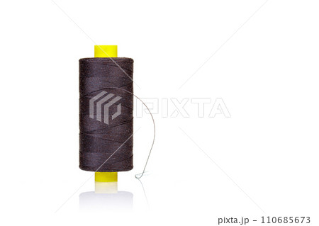 skein of thread brown colors macro on a white background skein of thread brown colors macro on a white background 110685673