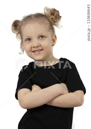 Little blonde girl with a smile on a white background. Little blonde girl with a smile on a white background. 110686643