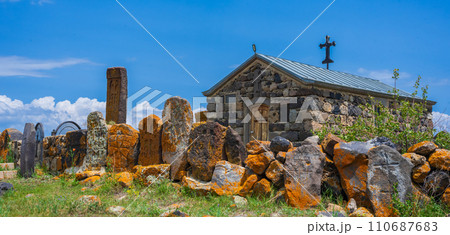 Artsvatrich Chapel on the shore of Lake Sevan, ancient khachkars with the image of a cross are Armenian shrines 110687683
