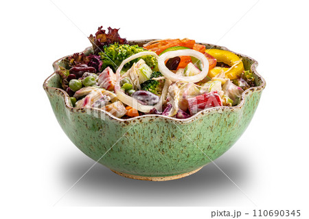 View of salad bowl isolated on white background. View of salad bowl isolated on white background. 110690345