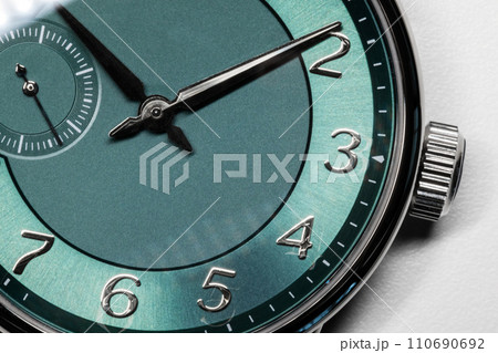 Gents wrist watch with green clock, macro photo 110690692