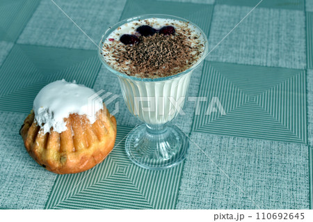 Baba cake and yogurt. Baba cake and yogurt. 110692645