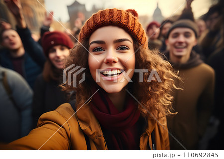 Empowered Diversity Joyful Woman in a Vibrant Street Rally Amongst a Diverse Demonstrating Group. created with Generative AI 110692845