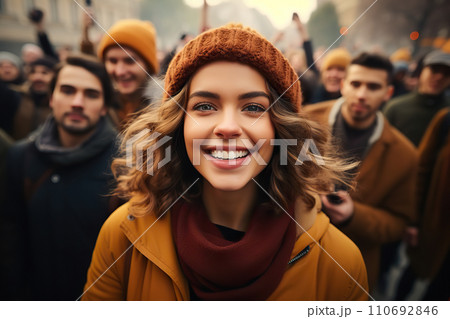 Empowered Diversity Joyful Woman in a Vibrant Street Rally Amongst a Diverse Demonstrating Group. created with Generative AI 110692846