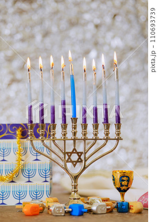 During Hanukkah Jewish religion holiday celebration, Hanukkiah Menorah candlelights 110693739