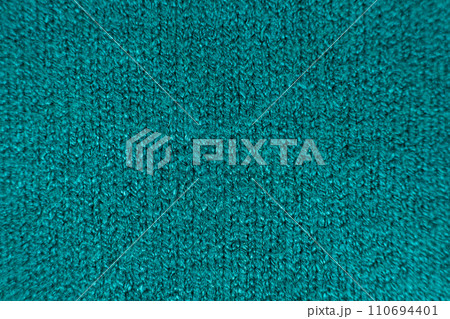 Green soft fabric made of viscose, polyester and nylon. Woven industry, fabric for sweater Green soft fabric made of viscose, polyester and nylon. Woven industry, fabric for sweater 110694401