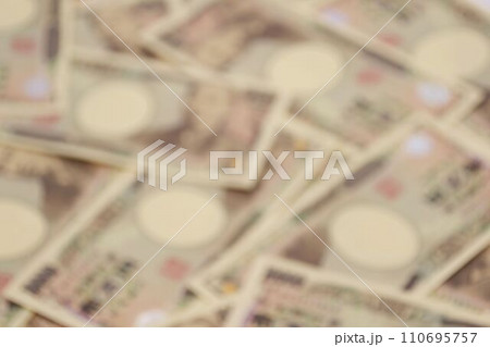 お金イメージ 壱万円札の背景素材 ぼかし お金イメージ 壱万円札の背景素材 ぼかし 110695757