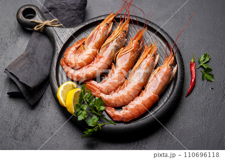 Fresh seafood. Board with langoustines Fresh seafood. Board with langoustines 110696118