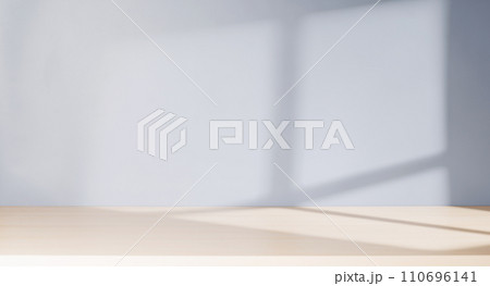 Wooden table and sunlit wall, product template Wooden table and sunlit wall, product template 110696141