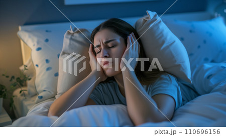 AI-generated content. Woman Laying in Bed With Head in Hands 110696156