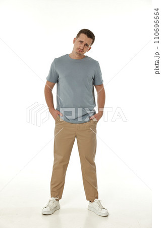 offended frustrated young man on white background. sadness offended frustrated young man on white background. sadness 110696664