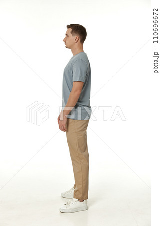 handsome young calm man on white background 110696672