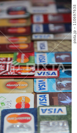 Close up of many VISA and Mastercard credit cards close up. Plastic bank cards Close up of many VISA and Mastercard credit cards close up. Plastic bank cards 110697638