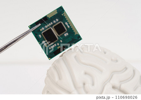 Human brain and computer chip. Human brain and computer chip. 110698026