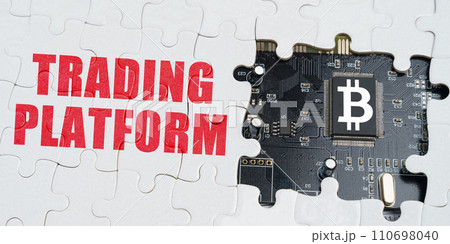 On the puzzles there is a processor with a bitcoin symbol and it says - Trading platform 110698040