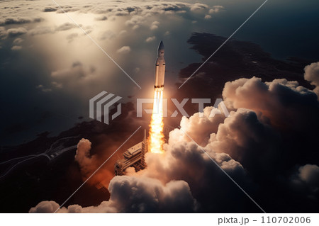 Aerial view of rocket launch at sunrise over ocean coast 110702006